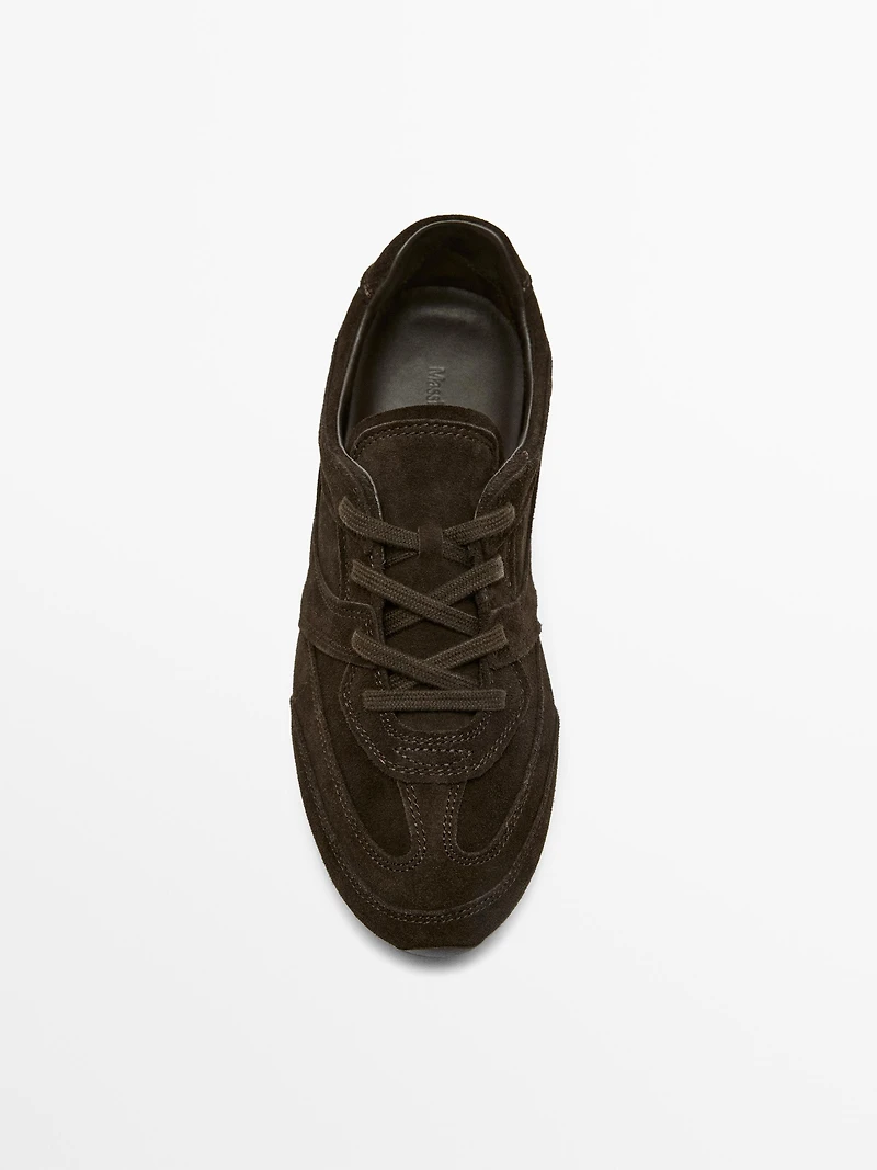 Split leather trainers with piece details