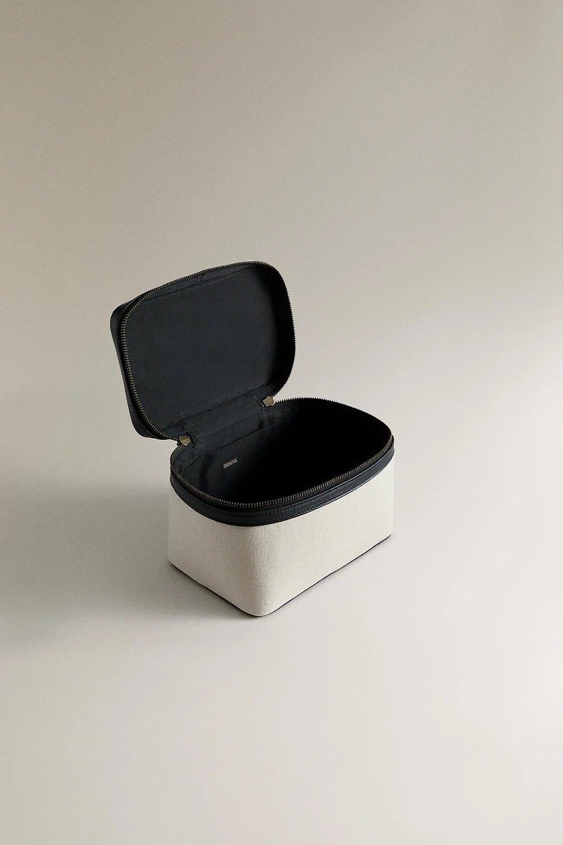 RIGID CANVAS AND LEATHER MAKEUP BAG