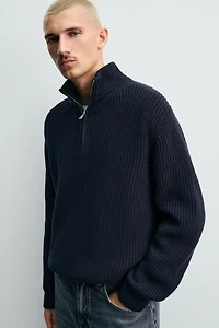 PULL EN MAILLE PERLÉE À COL ZIPPÉ