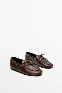 Leather lace-up boat shoe