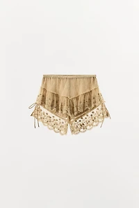 EMBROIDERED RUFFLE SHORTS