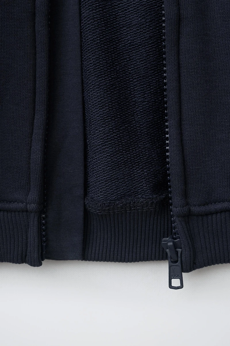 SWEAT ZIPPÉ À CAPUCHE