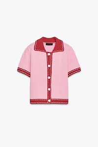 VESTE EN MAILLE SURPIQÛRES MANCHES COURTES