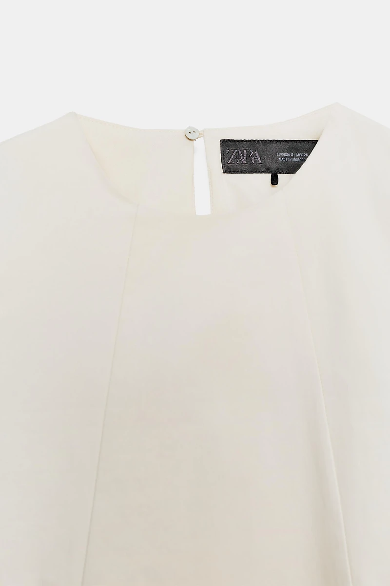 VOLUME SLEEVE CROP TOP