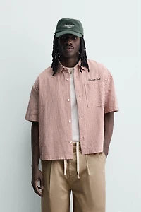 CHEMISE COUPE BOXY À CARREAUX BRODÉE