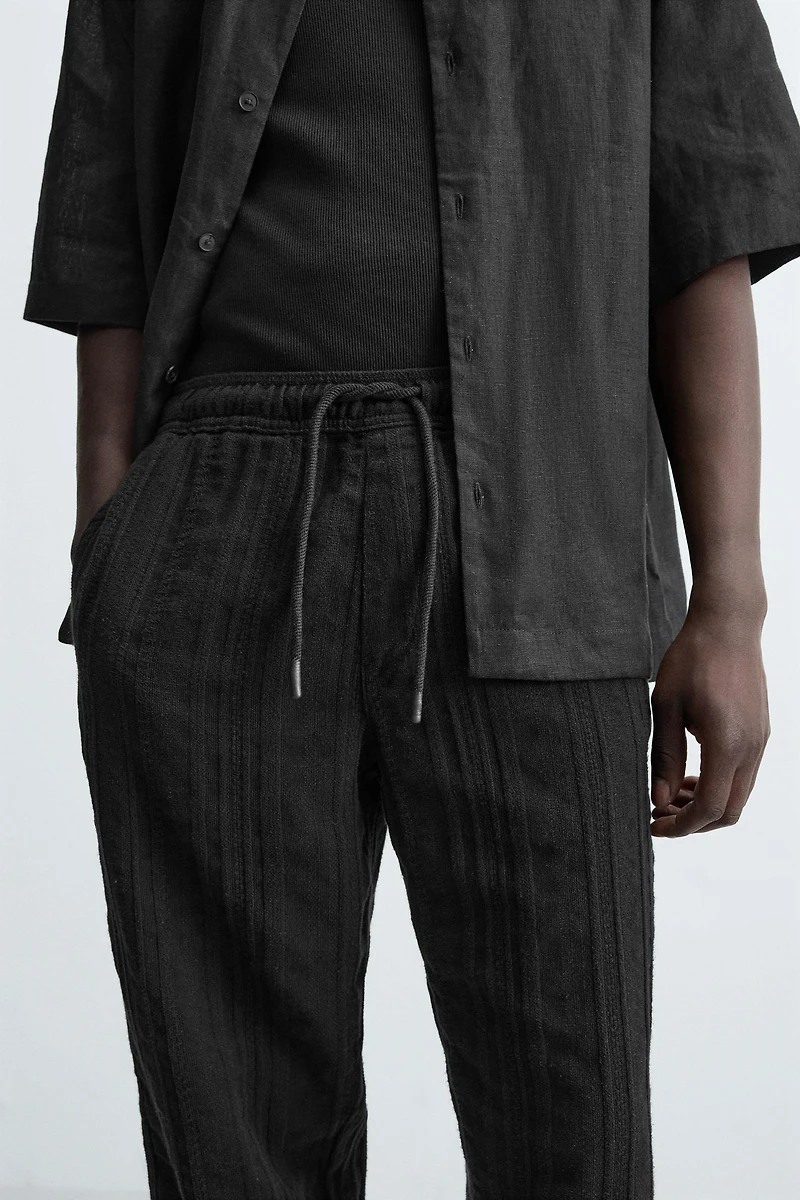 TEXTURED RELAXED FIT PANTS