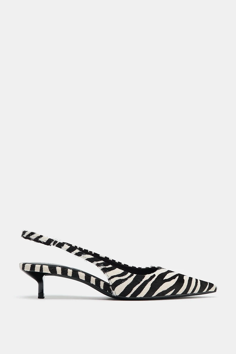 CHAUSSURES EN CUIR À IMPRIMÉ ANIMALIER