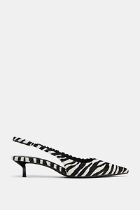 CHAUSSURES EN CUIR À IMPRIMÉ ANIMALIER