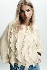 BLOUSE ROMANTIQUE À VOLANTS