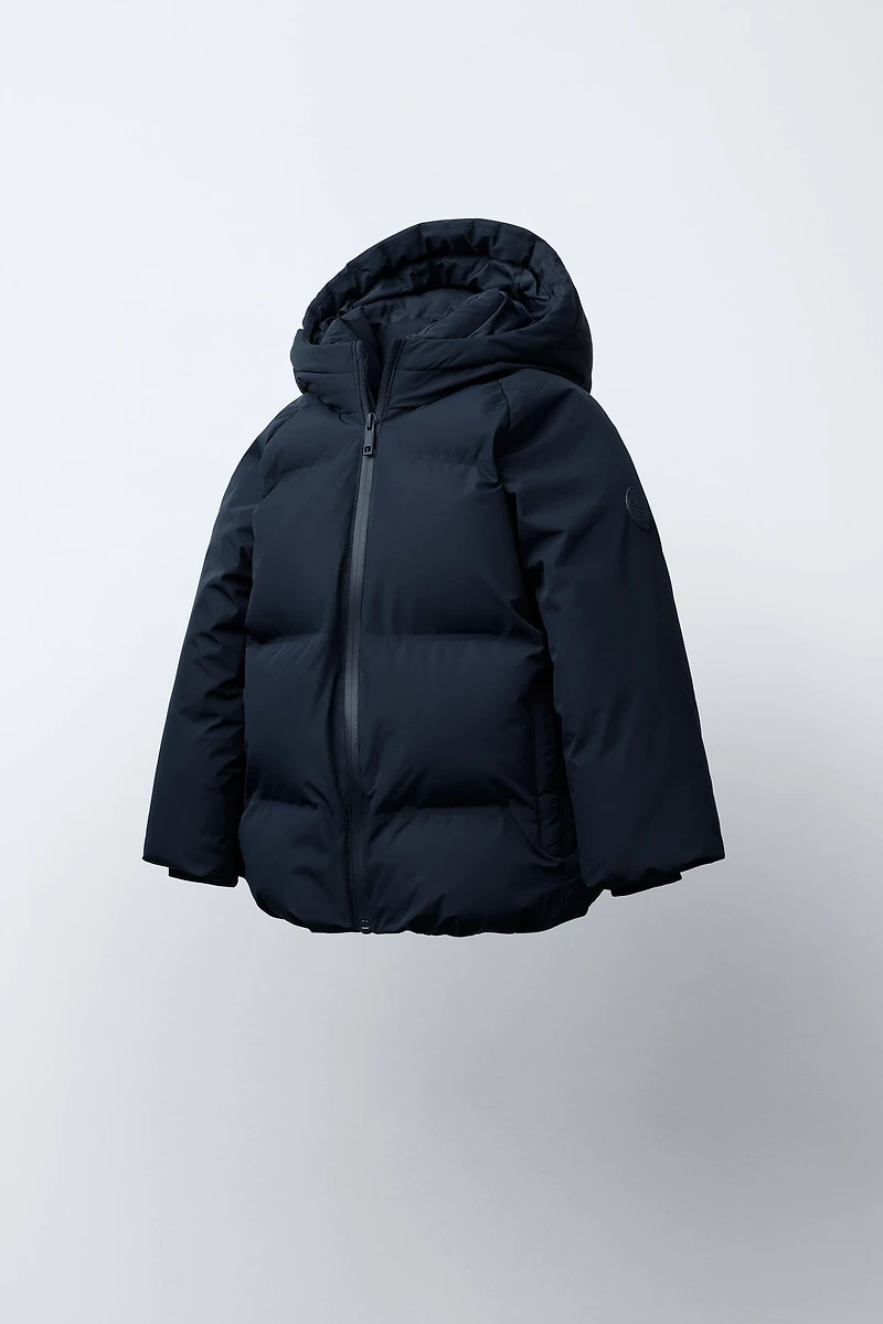 BLOUSON MATELASSÉ À CAPUCHE DÉPERLANT