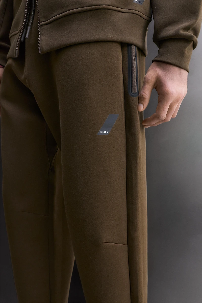 TECHNICAL PANTS WITH ZIPPERS