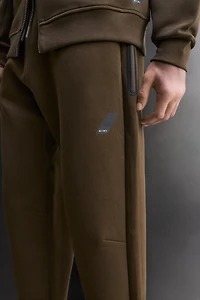 TECHNICAL PANTS WITH ZIPPERS