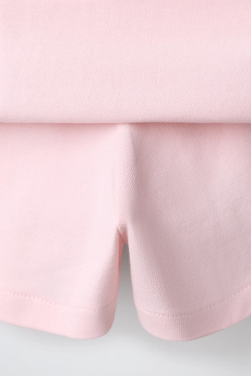 JUPE-SHORT À PLIS PLATS EN PIQUÉ