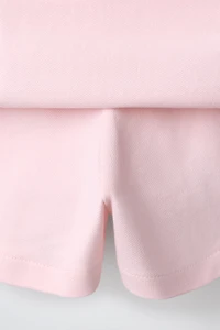 JUPE-SHORT À PLIS PLATS EN PIQUÉ