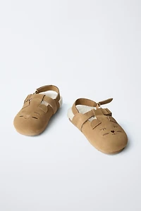 ANIMAL PRINT LEATHER CLOGS