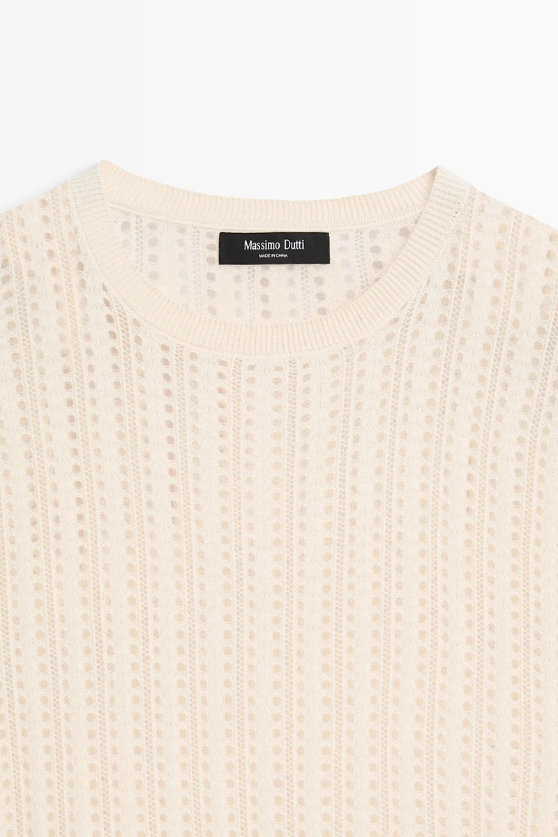 Short sleeve cutwork knit top