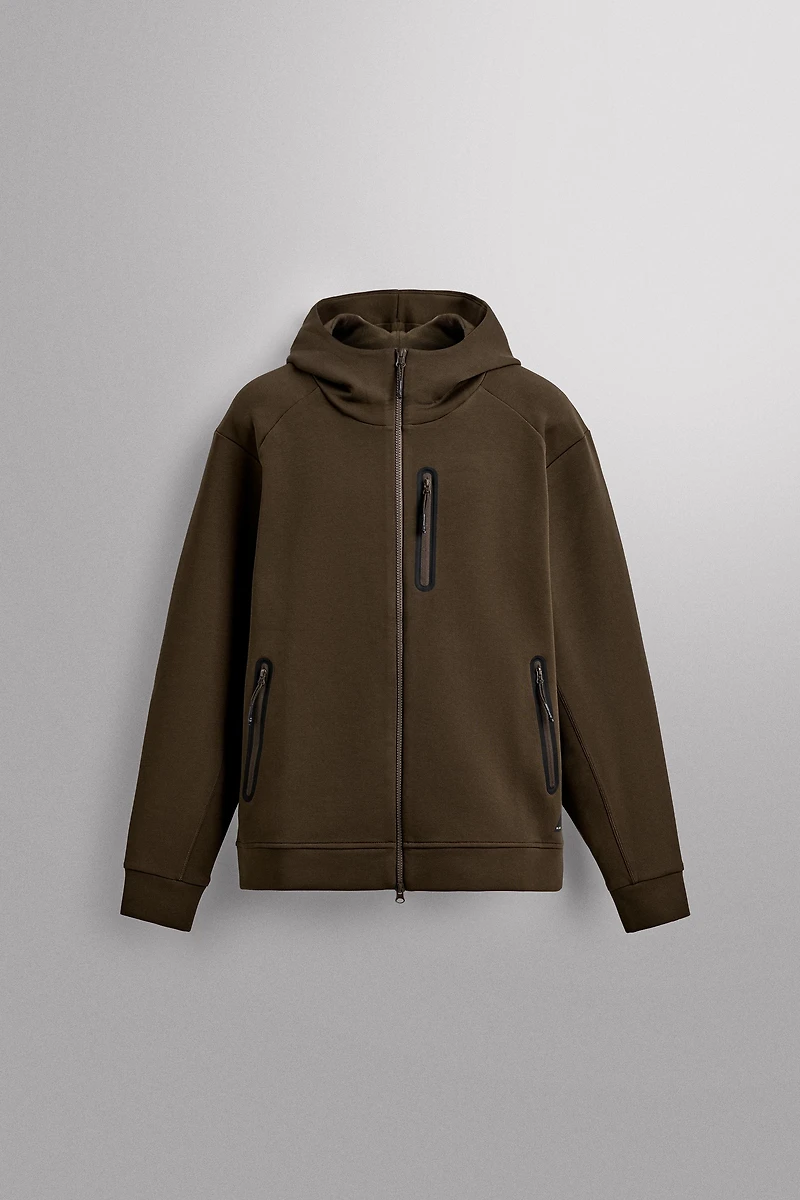 SWEAT TECHNIQUE ZIPPÉ À CAPUCHE