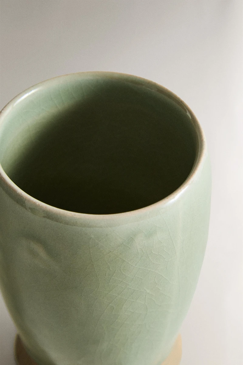 GREENISH TOOTHBRUSH HOLDER