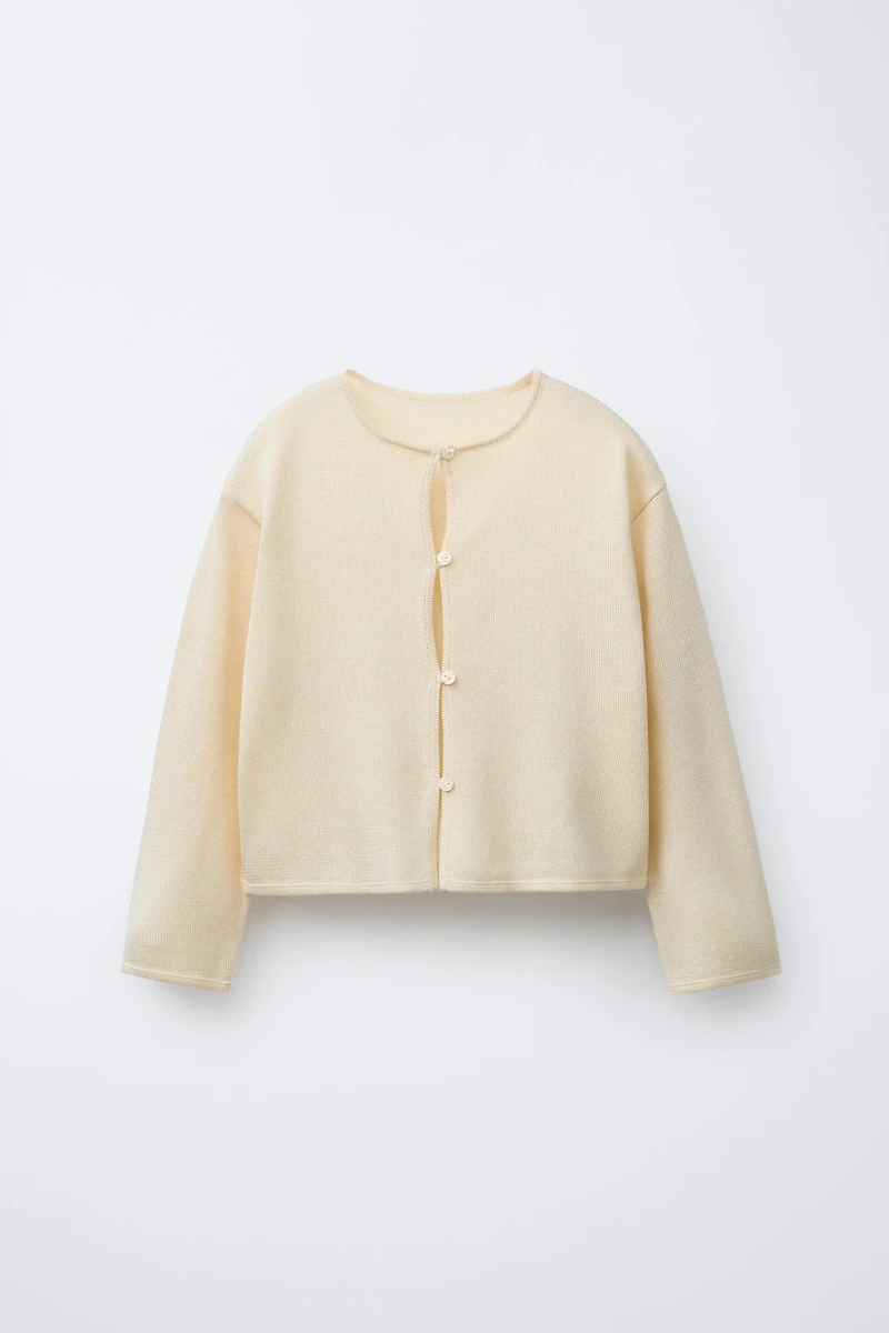 GILET EN MAILLE FLUIDE AVEC SOIE