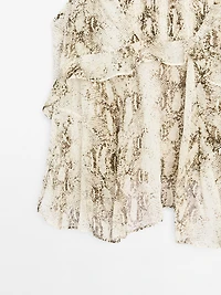 Ruffled snakeskin print top with gathered detail