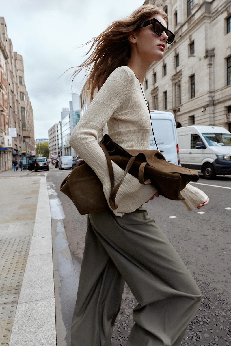 BELL SLEEVE POINTELLE KNIT SWEATER