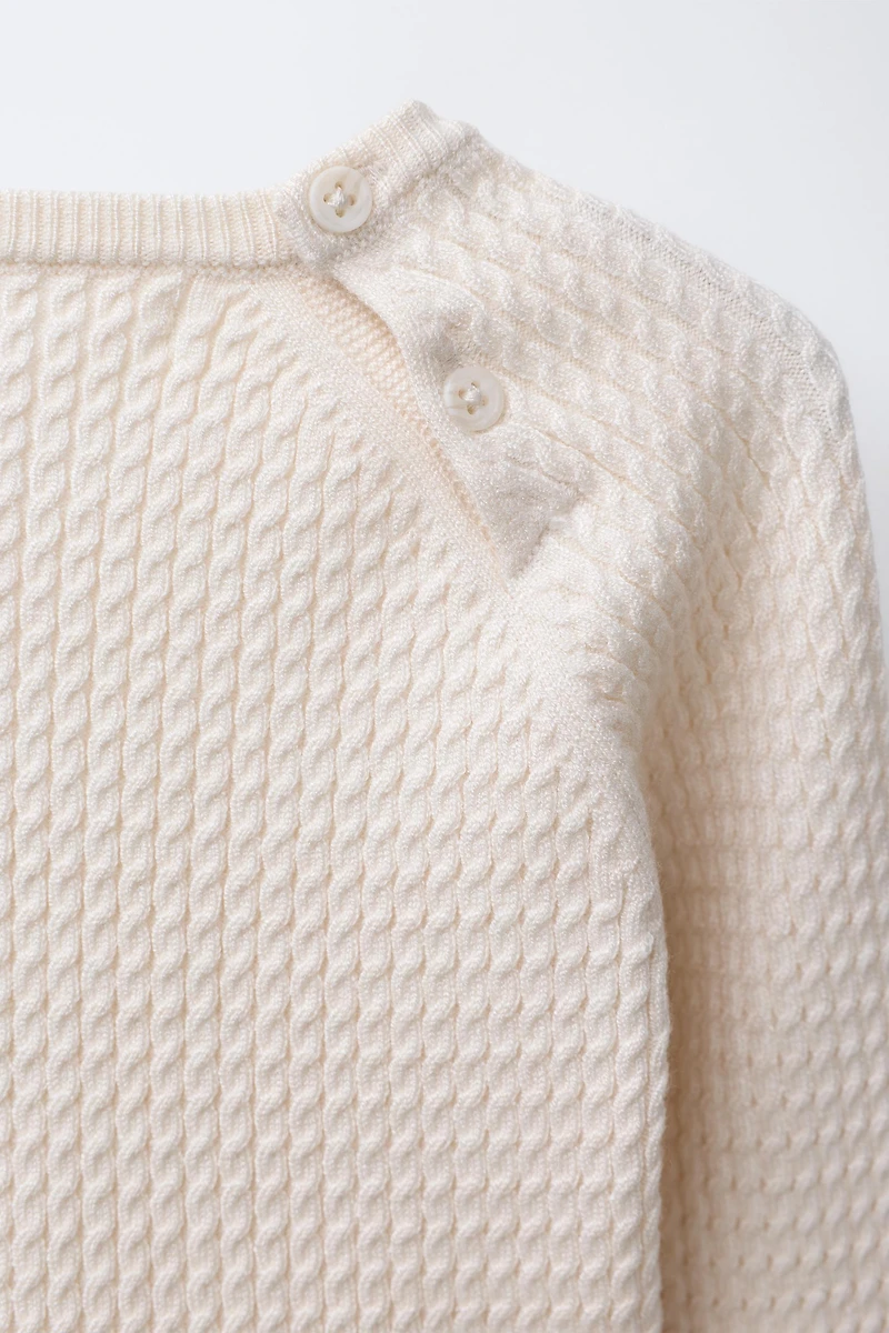 CABLE KNIT SWEATER