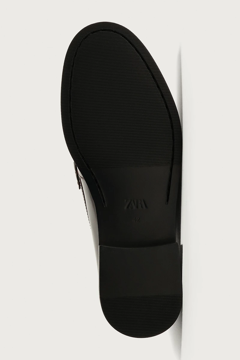 MOCASSINS EN CUIR À MASQUE