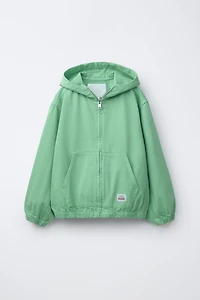 BLOUSON CAPUCHE ÉTIQUETTE