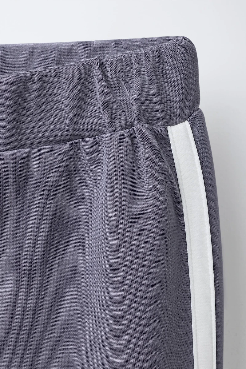 FLARE PANTS WITH CONTRAST STRIPES AND MODAL