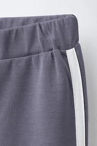 FLARE PANTS WITH CONTRAST STRIPES AND MODAL