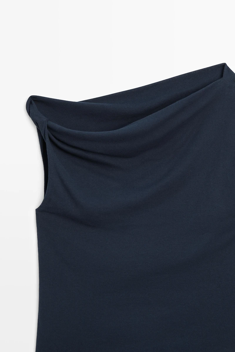 Top asymétrique à épaules tombantes