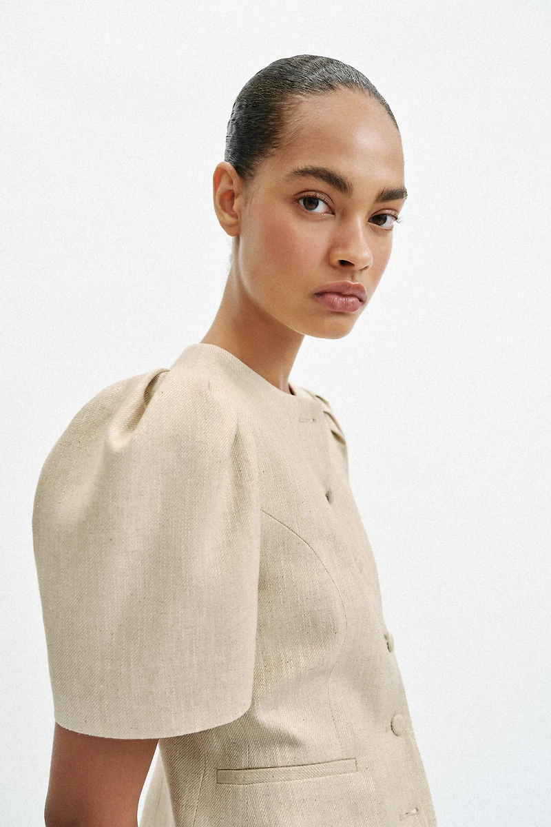 VESTE À MANCHES COURTES BOUFFANTES