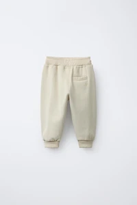 FLOCKED LOGO JOGGER PANTS