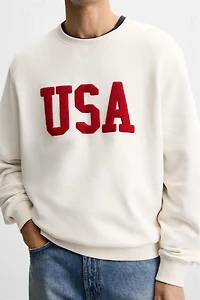 TEXTURED PATCH SWEATSHIRT