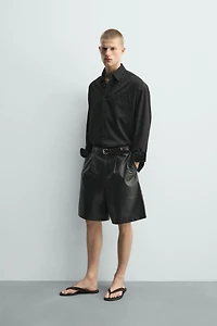RELAXED FIT LEATHER PLEATED SHORTS