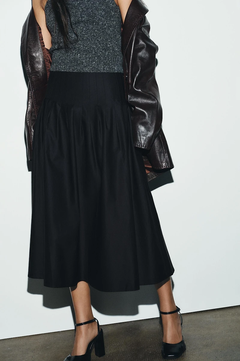 PLEATED MIDI SKIRT