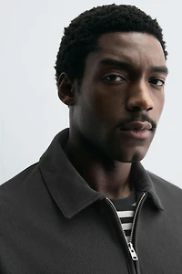 TEXTURED ZIP POLO SHIRT