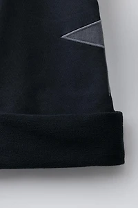 PANTALON EN MOLLETON EFFET DÉLAVÉ À JAMBES LARGES ÉTOILES