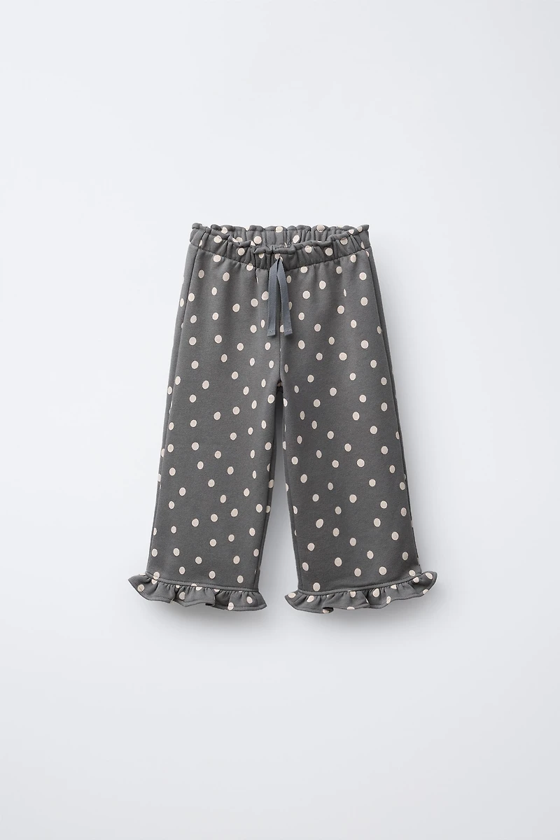 PANTALON EN MOLLETON IMPRIMÉ À VOLANTS