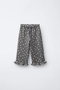 PANTALON EN MOLLETON IMPRIMÉ À VOLANTS