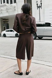 LONG PLEATED SHORTS