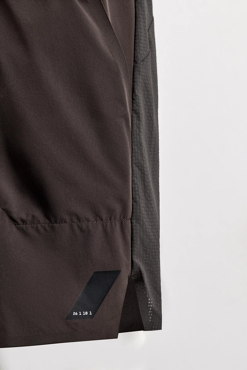 COLOR BLOCK RUNNING SHORTS