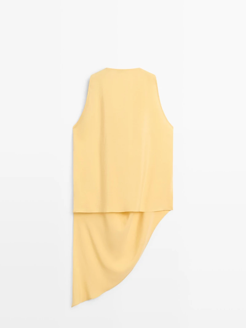 Top long fluide asymétrique