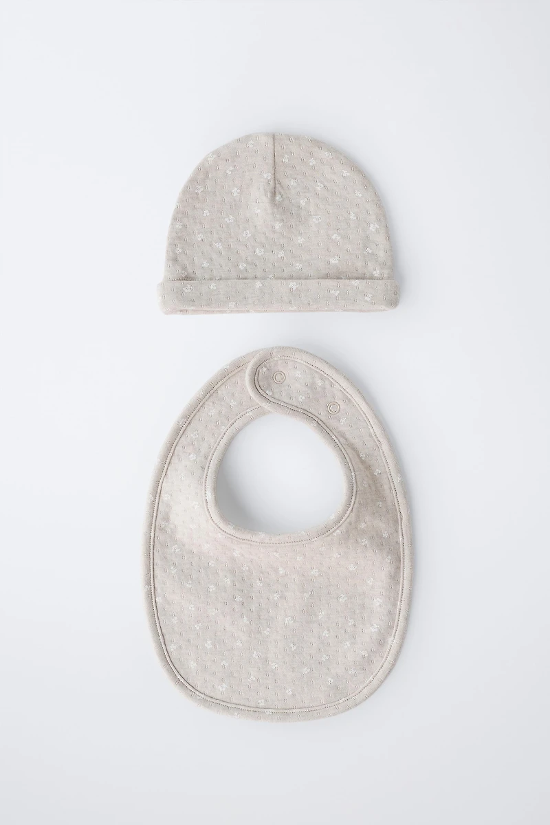 TWO-PIECE PRINTED TEXTURED HAT AND BIB SET