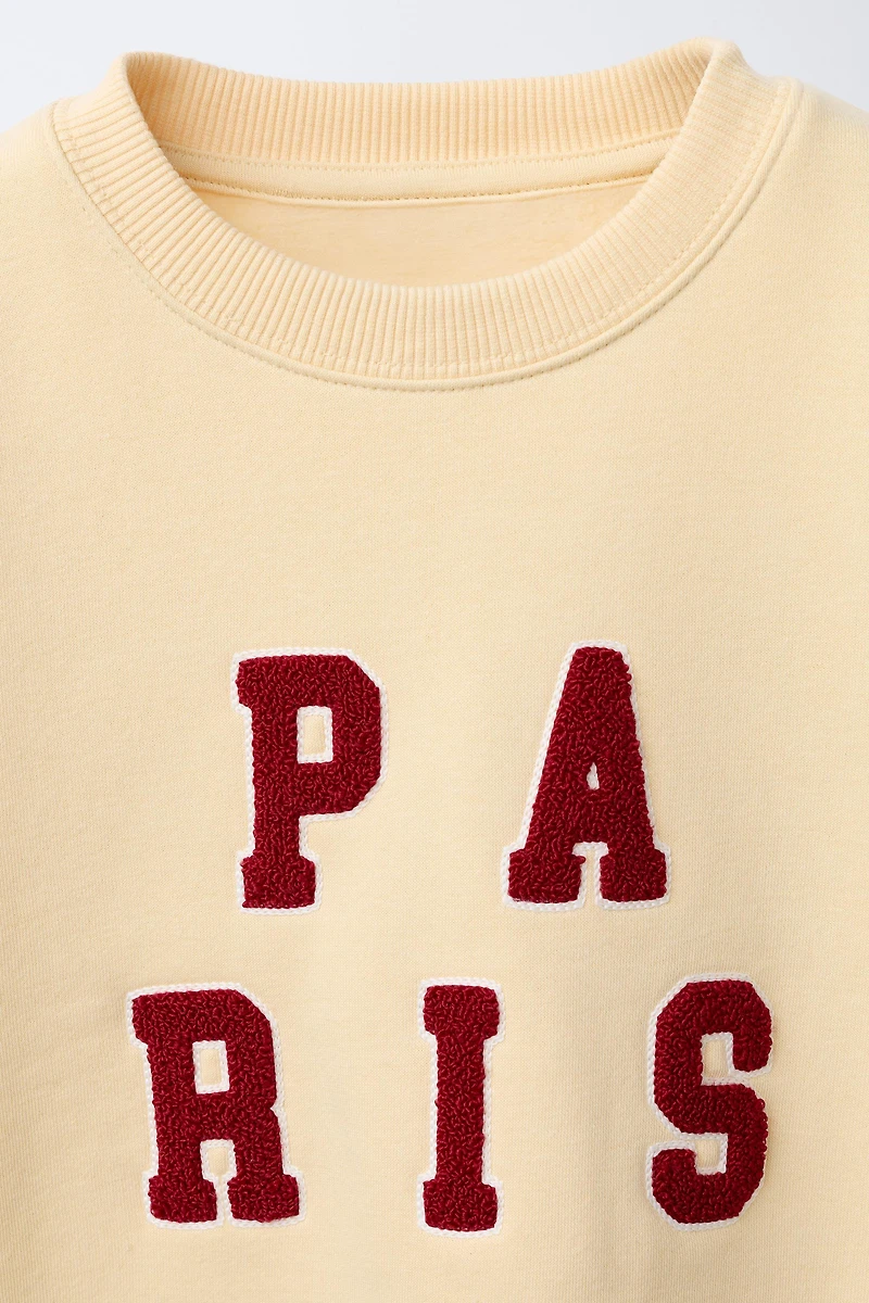 SWEAT AVEC PIÈCE EN VELOURS BOUCLÉ