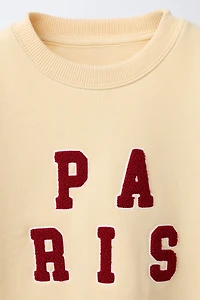 SWEAT AVEC PIÈCE EN VELOURS BOUCLÉ