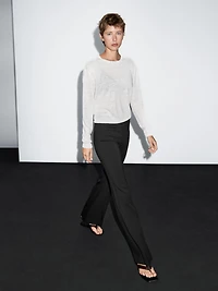 Flared trousers with pocket