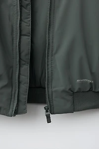 BLOUSON BOMBER GOMMÉ À CAPUCHE AMOVIBLE