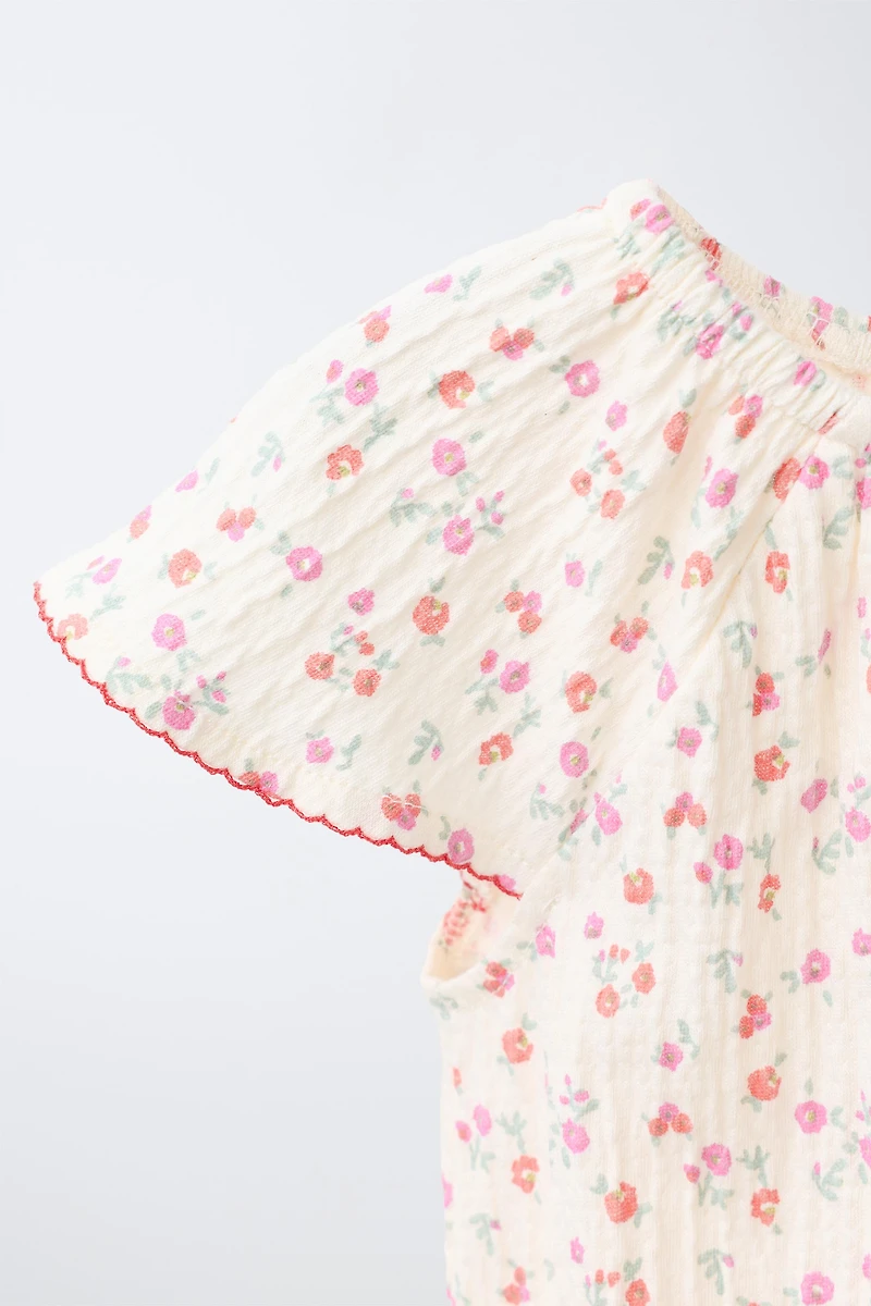 TEXTURED FLORAL BODYSUIT