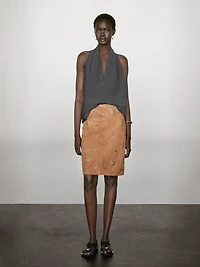 Suede leather skirt with rhinestone detail